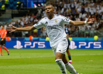 Real Madrid's French forward #09 Kylian Mbappe celebrates scoring during the UEFA Super Cup football match between Real Madrid and Atalanta BC in Warsaw, on August 14, 2024. (Photo by Wojtek RADWANSKI / AFP)