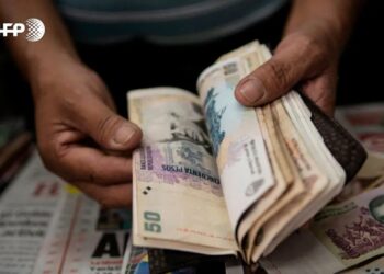 El peso argentino se depreció nuevamente/AFP