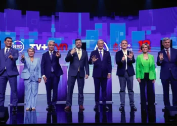 Los candidatos luego del último debate/AFP