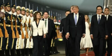 Trump durante su arribo a Pekín/AFP